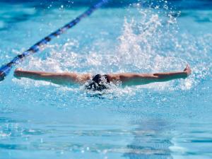 student swimming