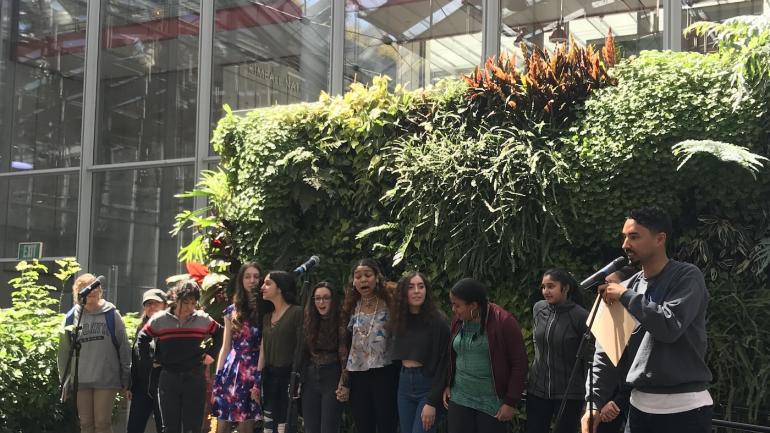 Student poets on stage at the California Academy of Sciences