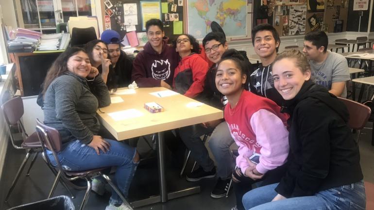 Students and teachers pose for a picture