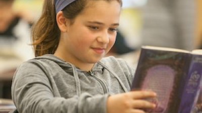Student reading a book