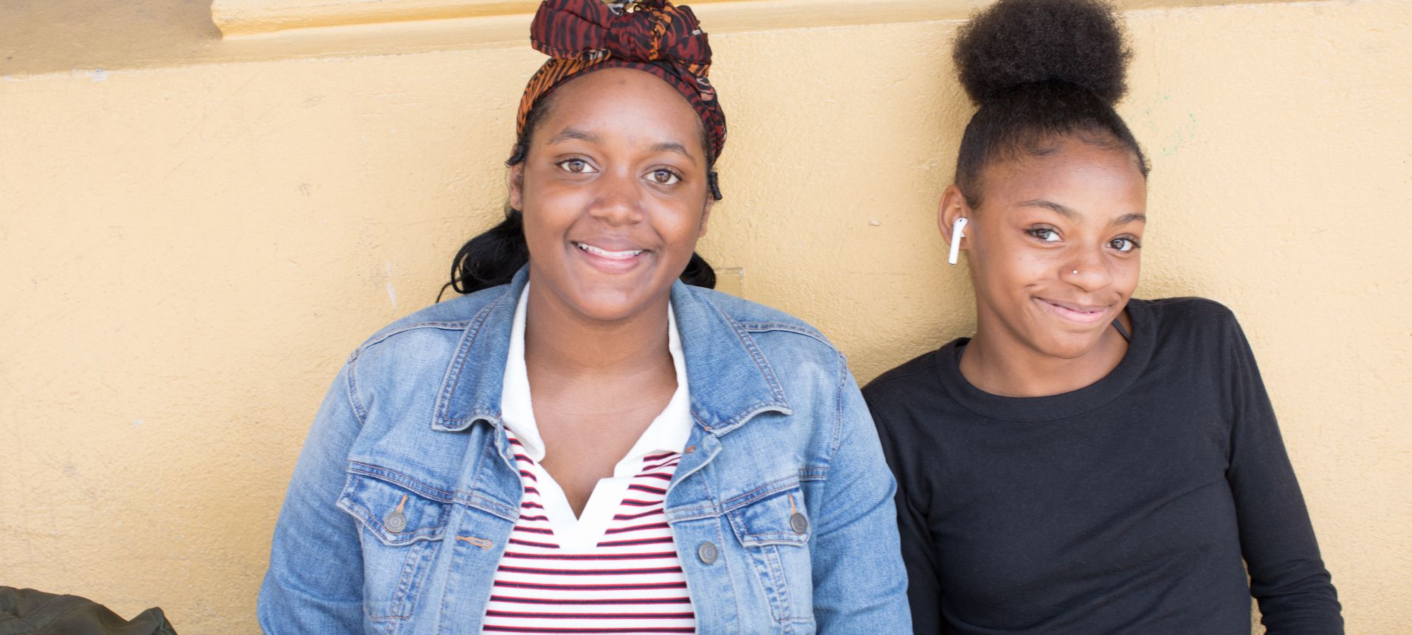 Two girls smiling