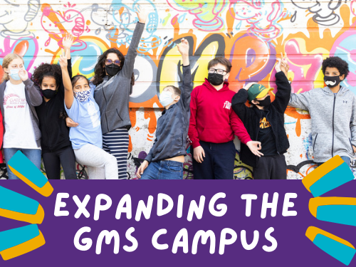 students pose in front of a mural