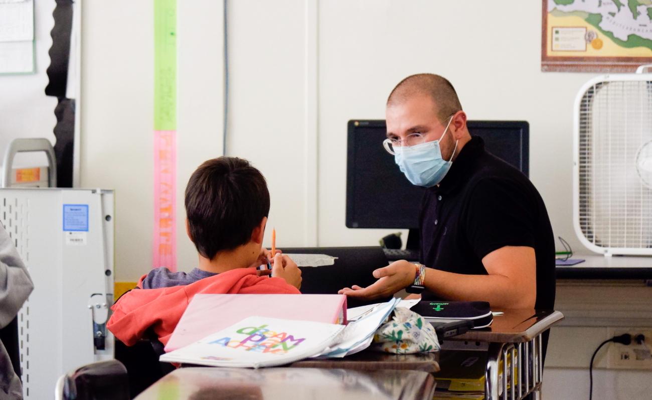 Male teacher with student