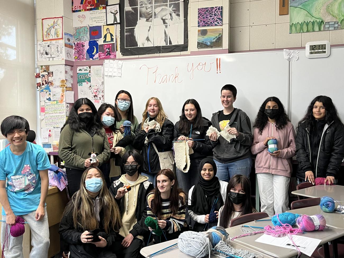 knitting students show off projects