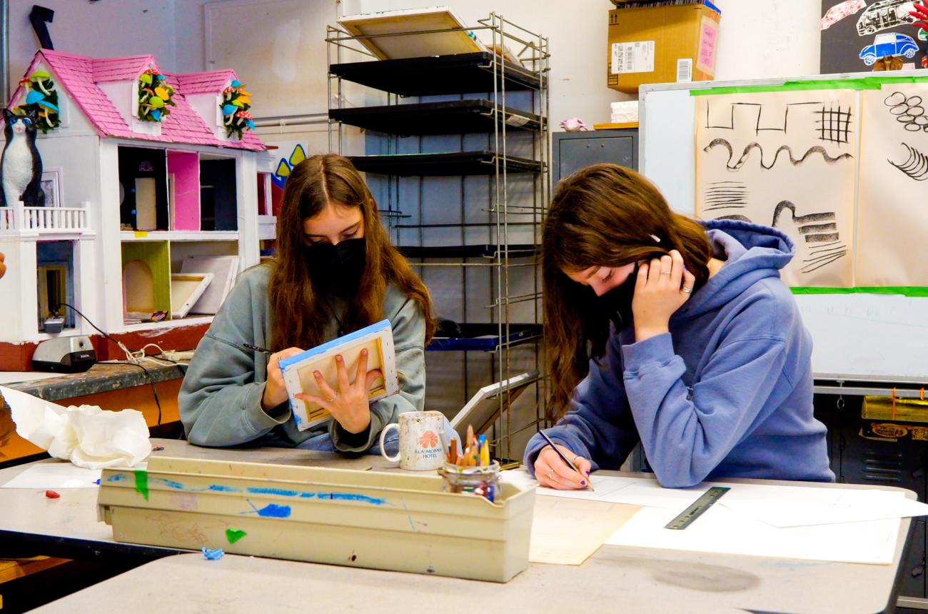 students painting