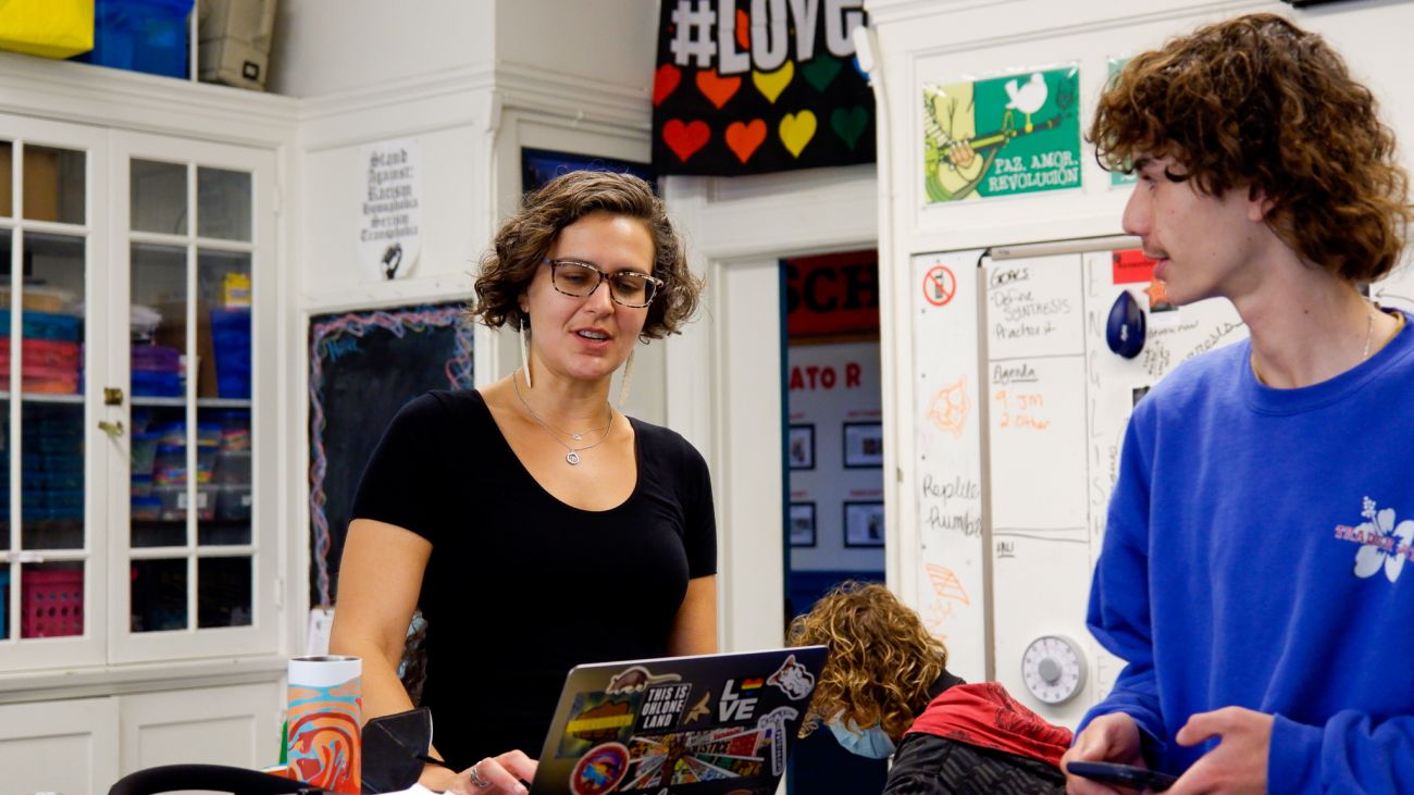 Female teacher coaching a student